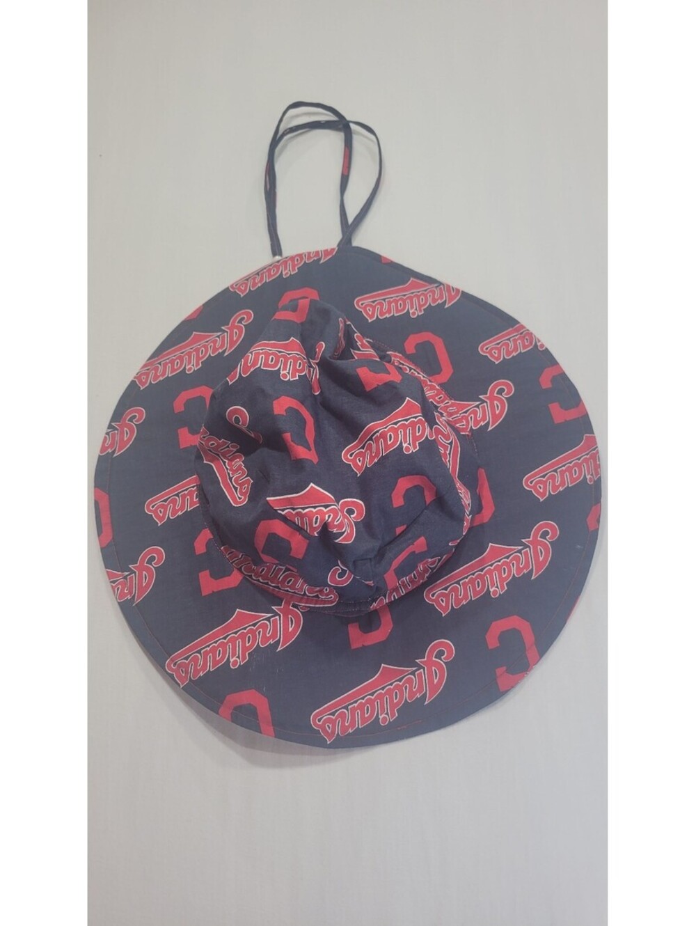 Cleveland Guardians Navy Blue Bucket Hat with Adjustable Chin Strap and All-Over
